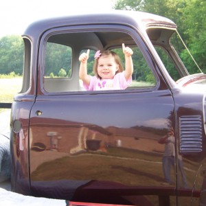 Granddaughter Emily in Parade Truck