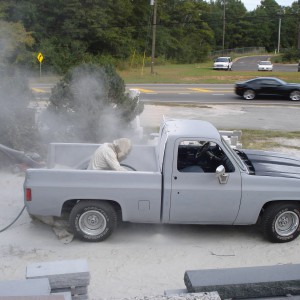 Side view during blasting. Notice the black camaro passing by!