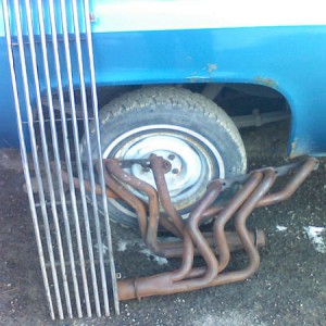 My grill and my aftermarket headers which are now installed on the truck!!