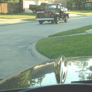 Leaving home.  Ken was critical of the rainspots on my truck (see the blurs on the windshield).