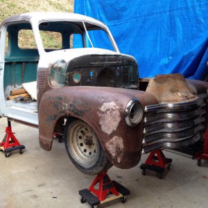 Bolted the fenders on to center the wheels. On a S10 suspension the wheel will travel 1 1/4" in the fender well depending on how much weight. I took o